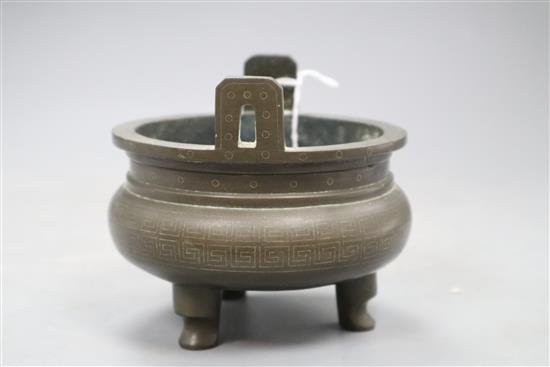 A 19th century Chinese silver inlaid bronze censer, height 10.5cm